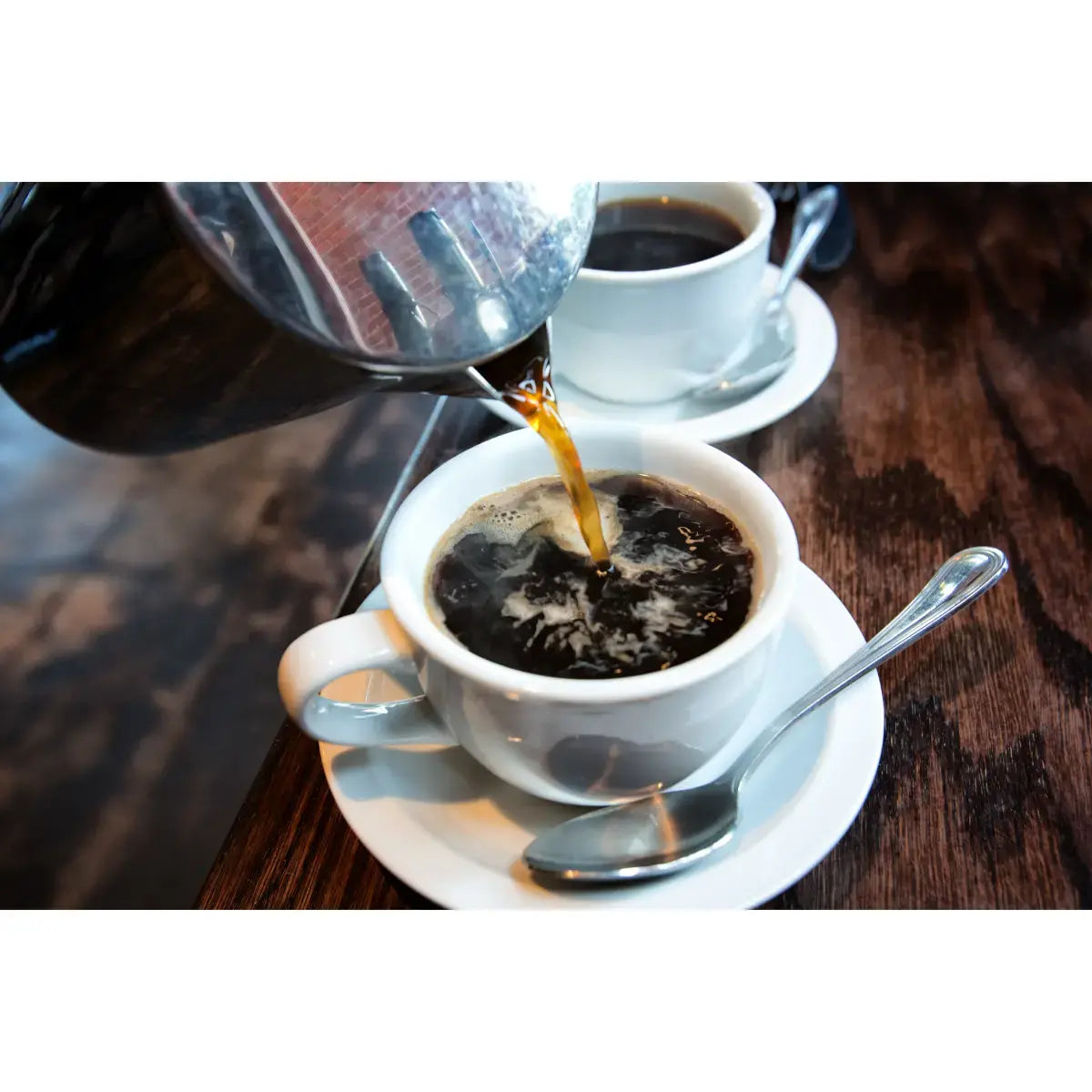 MONT58 Deliciously Dark Blend Coffee Beans pouring from press